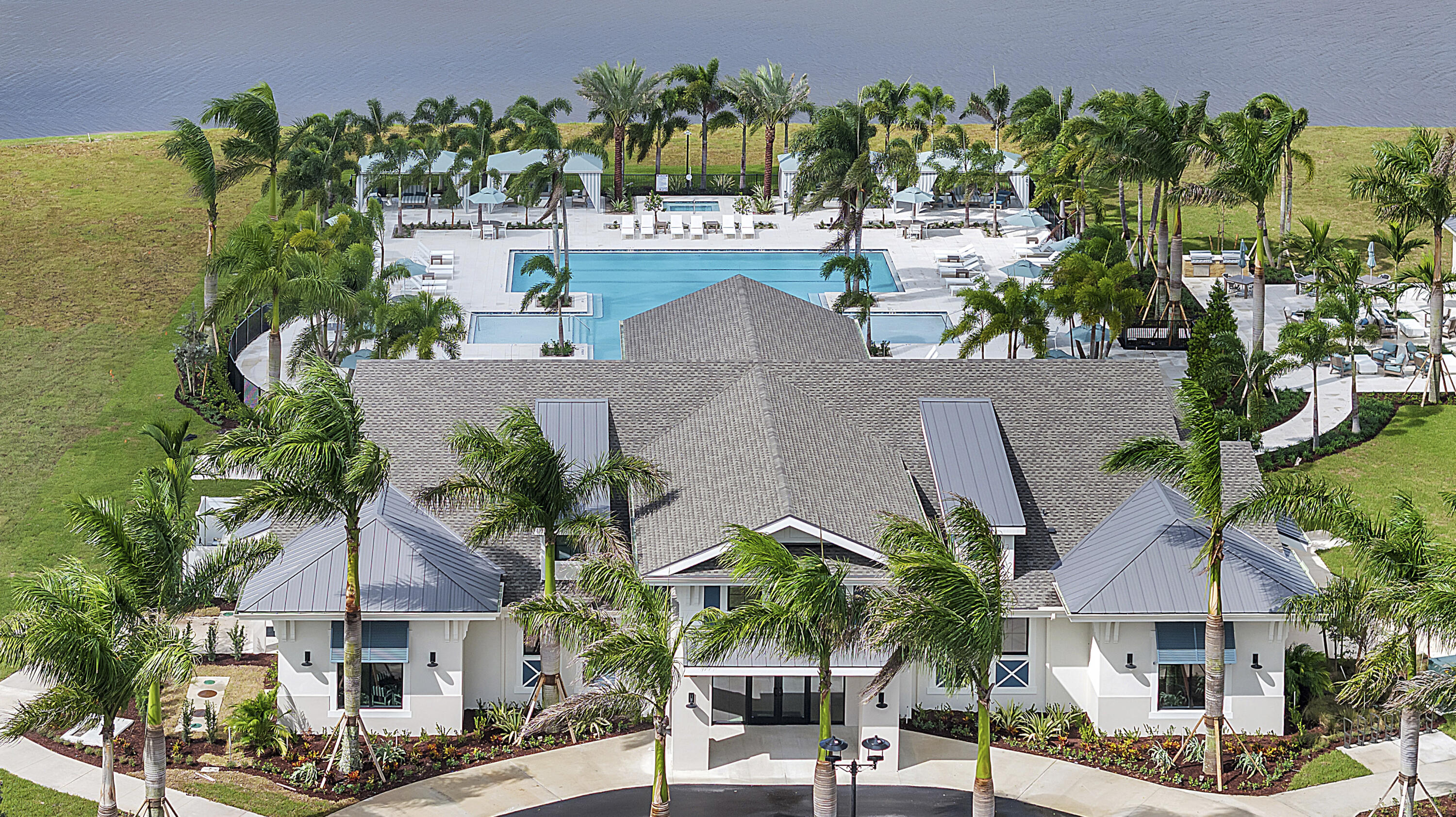 10099 Dreamweaver Road, Unit 51 Port St. Lucie, FL 34987 - Photo 25 of 36 an aerial view of a house with a garden and plants