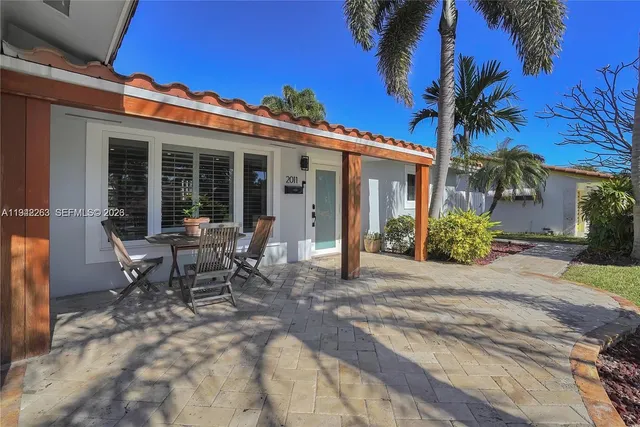 a view of a house with a patio