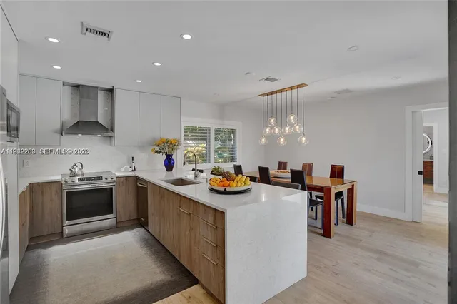 a kitchen with granite countertop lots of counter top space