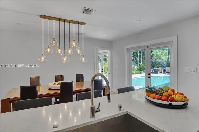 a view of a livingroom with furniture and window