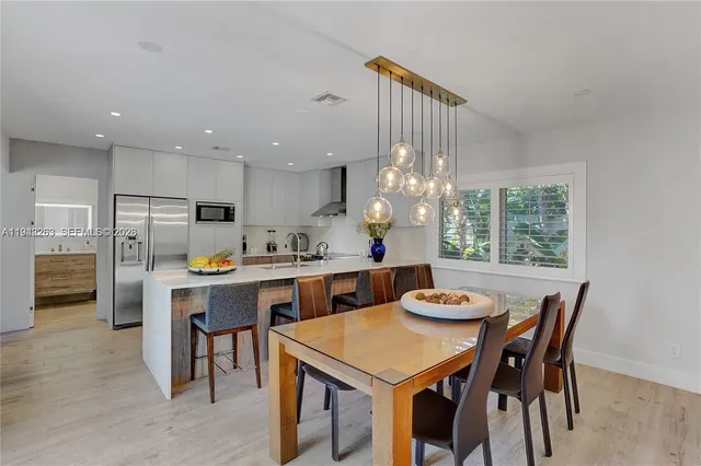 a view of a dining room with furniture