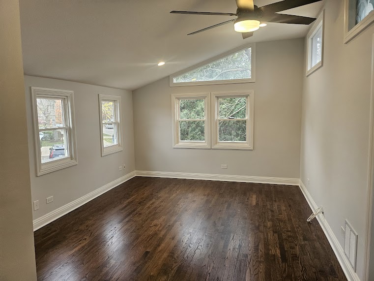 808 Indian Road Glenview, IL 60025 - Photo 14 of 20 an empty room with wooden floor and windows