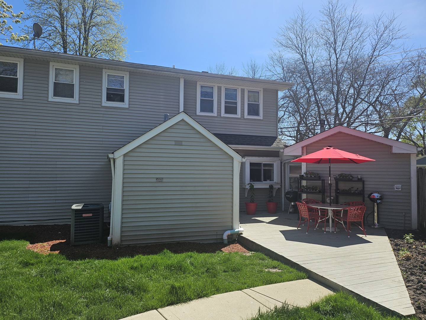 808 Indian Road Glenview, IL 60025 - Photo 20 of 20 a view of a house with backyard porch and sitting area