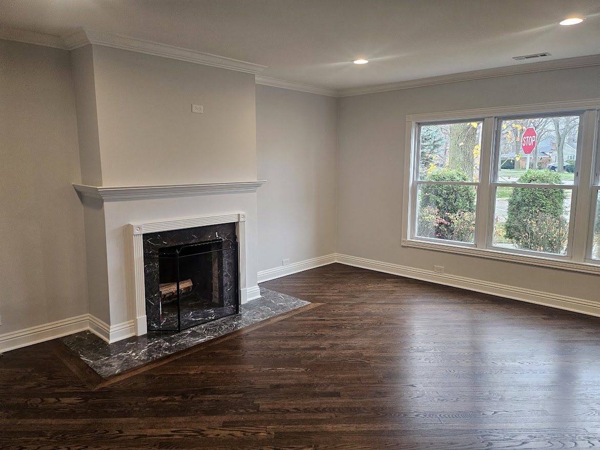 808 Indian Road Glenview, IL 60025 - Photo 9 of 20 a view of an empty room with wooden floor and a window