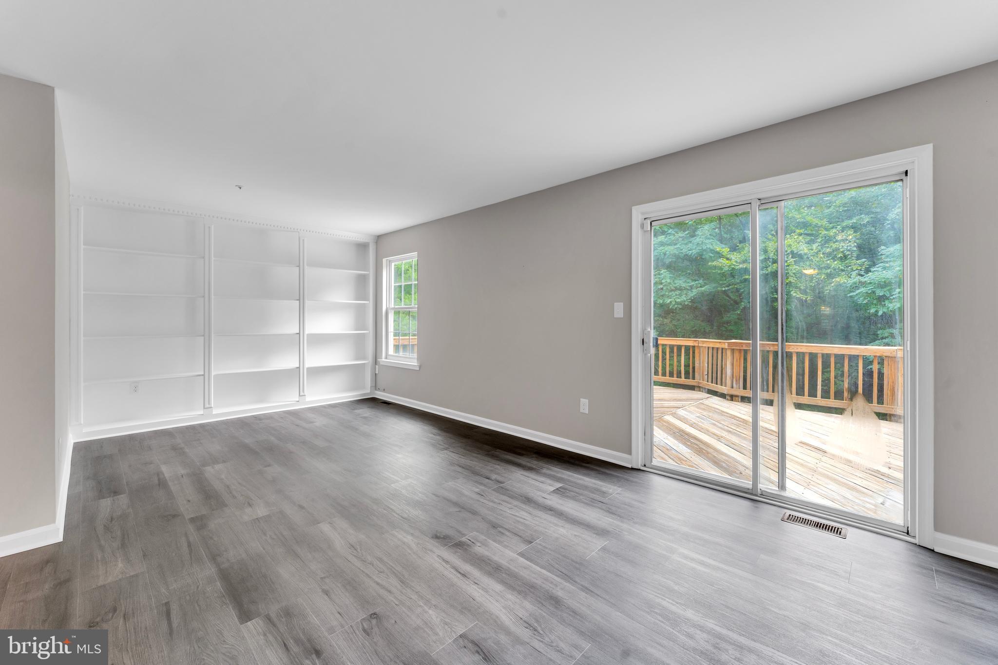 8800 Hardesty Drive Clinton, MD 20735 - Photo 20 of 34 built in shelving in living room