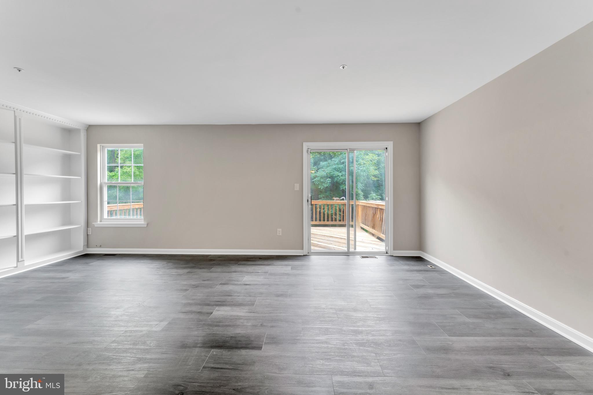 8800 Hardesty Drive Clinton, MD 20735 - Photo 21 of 34 living room can exit to deck
