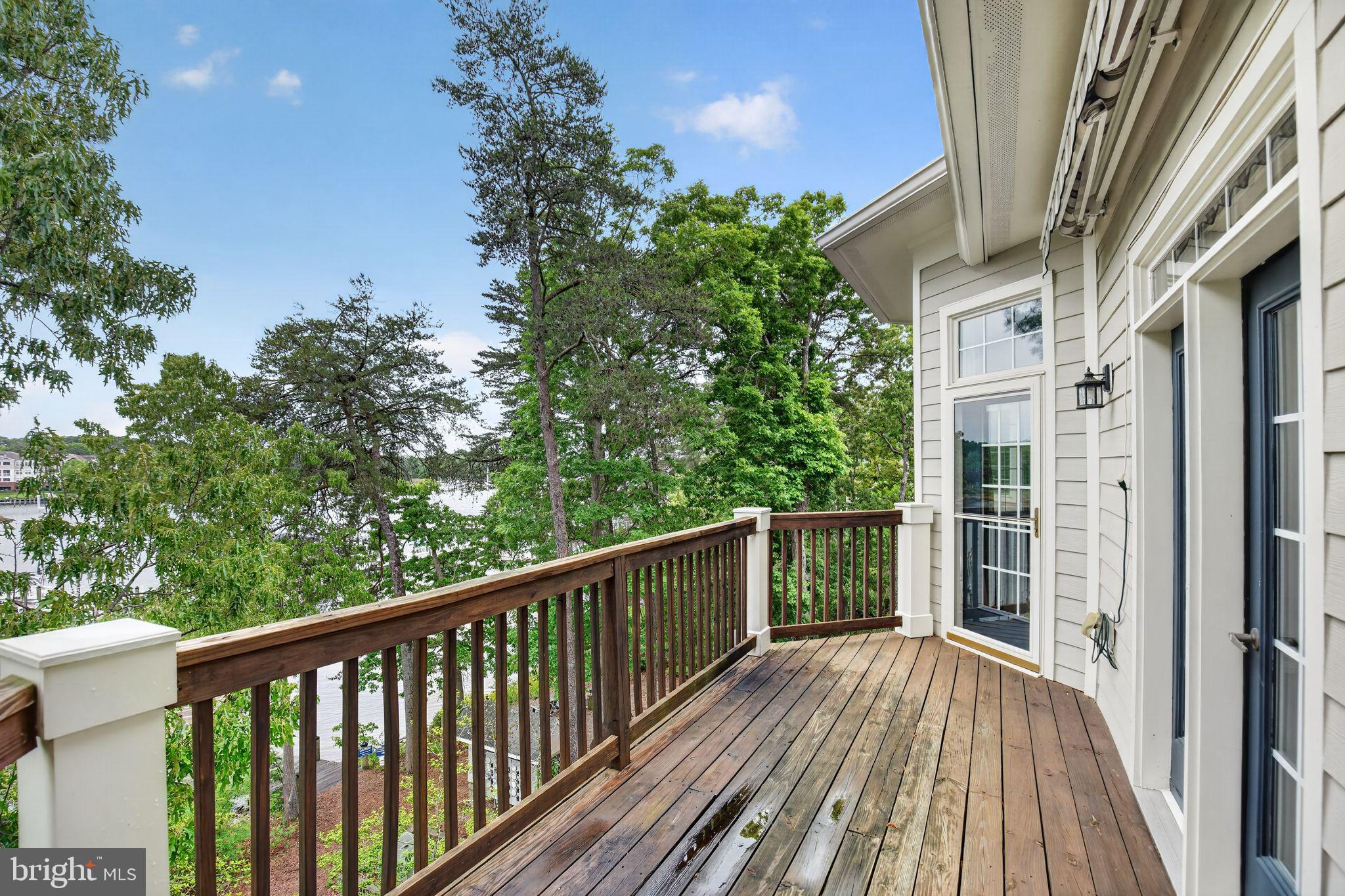733 Runabout Loop, Unit 733 Solomons, MD 20688 - Photo 27 of 50 Deck overlooking water with retractable awning