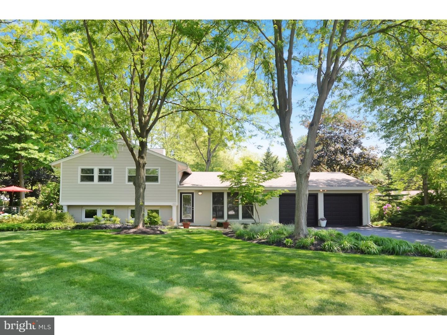 32 Penn Lyle Road Princeton Junction, NJ 08550 - Photo 1 of 25 a front view of a house with a garden
