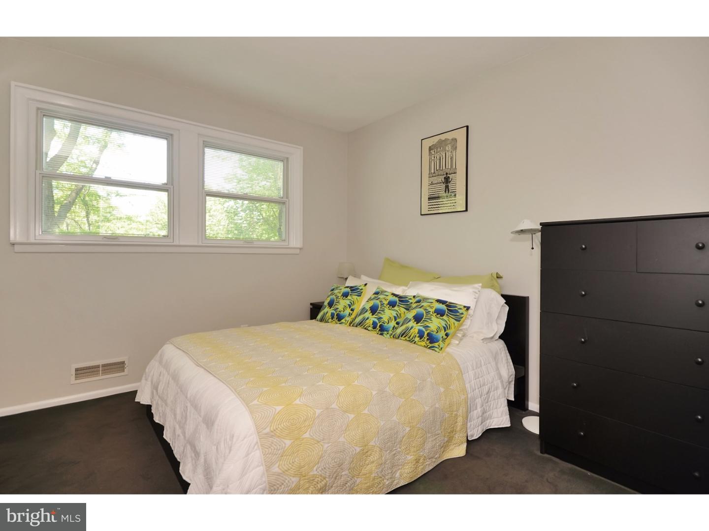 32 Penn Lyle Road Princeton Junction, NJ 08550 - Photo 21 of 25 a bedroom with a bed and a window