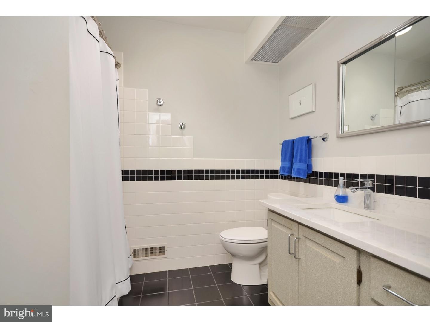 32 Penn Lyle Road Princeton Junction, NJ 08550 - Photo 22 of 25 a bathroom with a sink a toilet and a shower