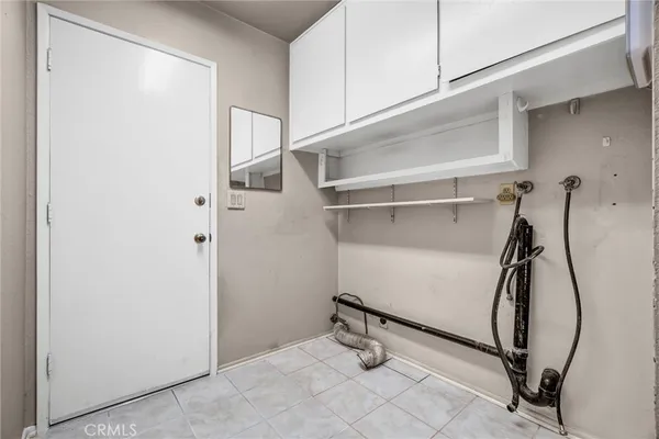a view of a room with rack on the wall
