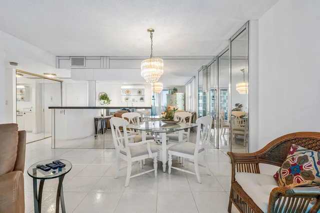 a spacious bedroom with a bed and a window