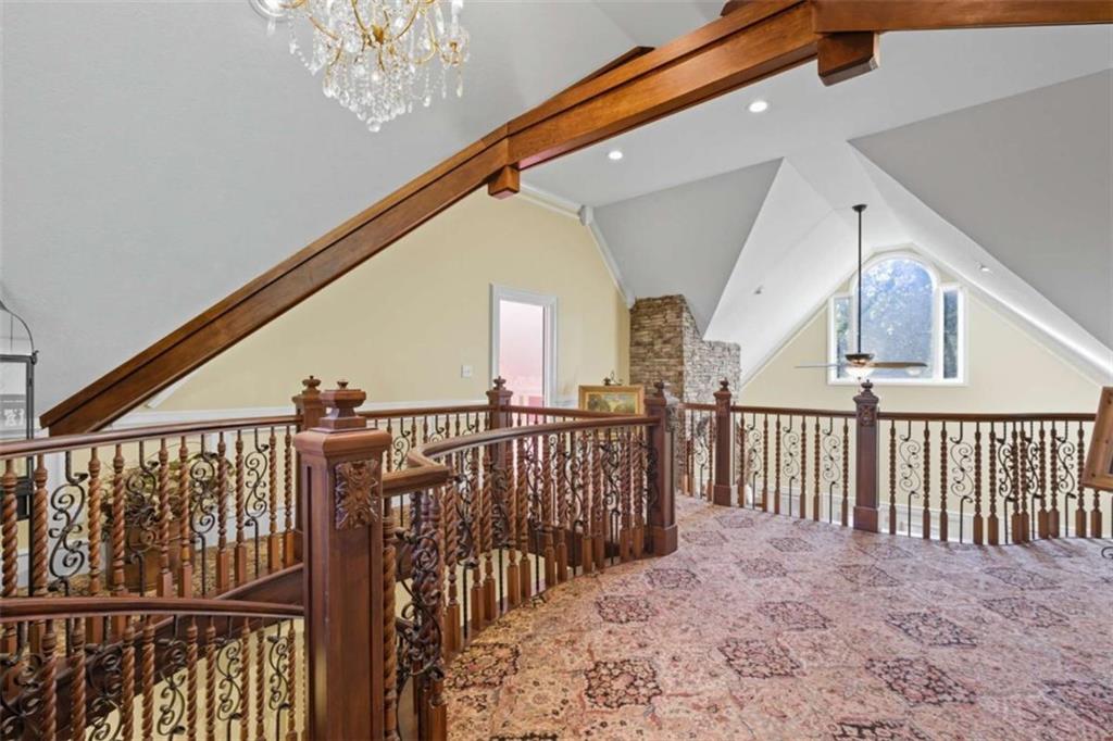 1091 Echota Road Clarkesville, GA 30523 - Photo 32 of 89 a view of staircase with railing and white walls