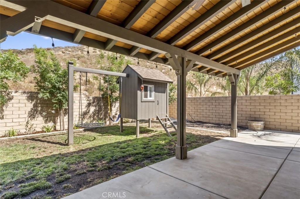 19120 Blackthorn Drive Canyon Country, CA 91351 - Photo 15 of 40 Custom built tile roof patio cover with ceiling fans