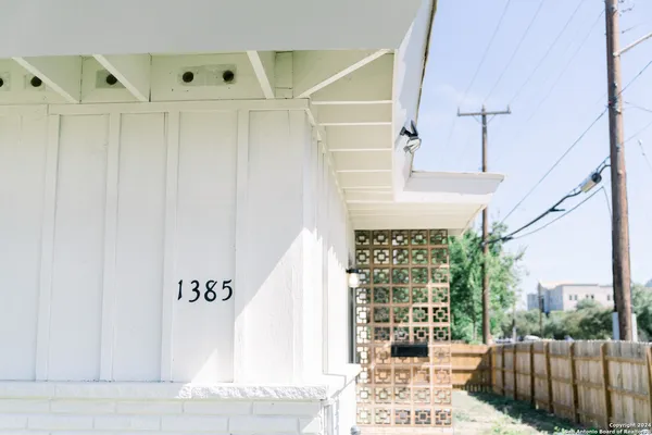 a view of balcony with wooden floor