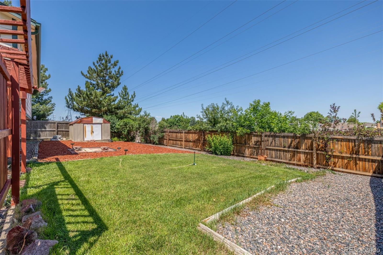 18083 East Atlantic Drive Aurora, CO 80013 - Photo 20 of 22 a view of a garden