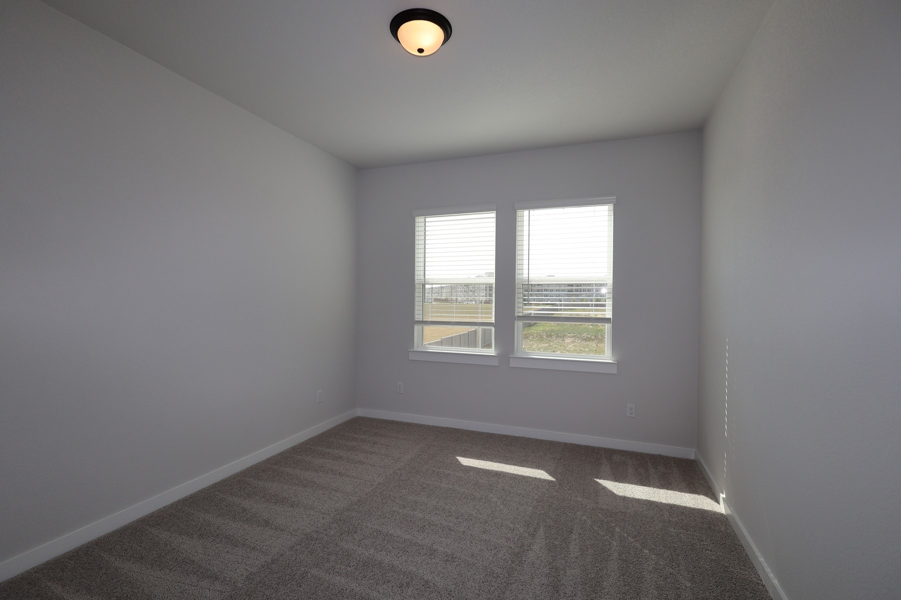 304 Emerie Way Georgetown, TX 78626 - Photo 7 of 15 an empty room with a window