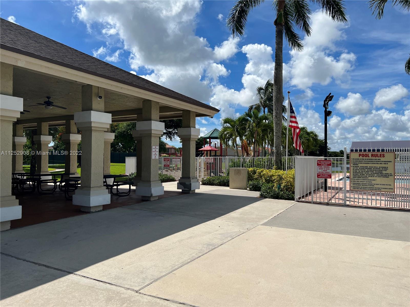 18790 Cloud Lake Circle Boca Raton, FL 33496 - Photo 24 of 27 a view of a building with sitting area