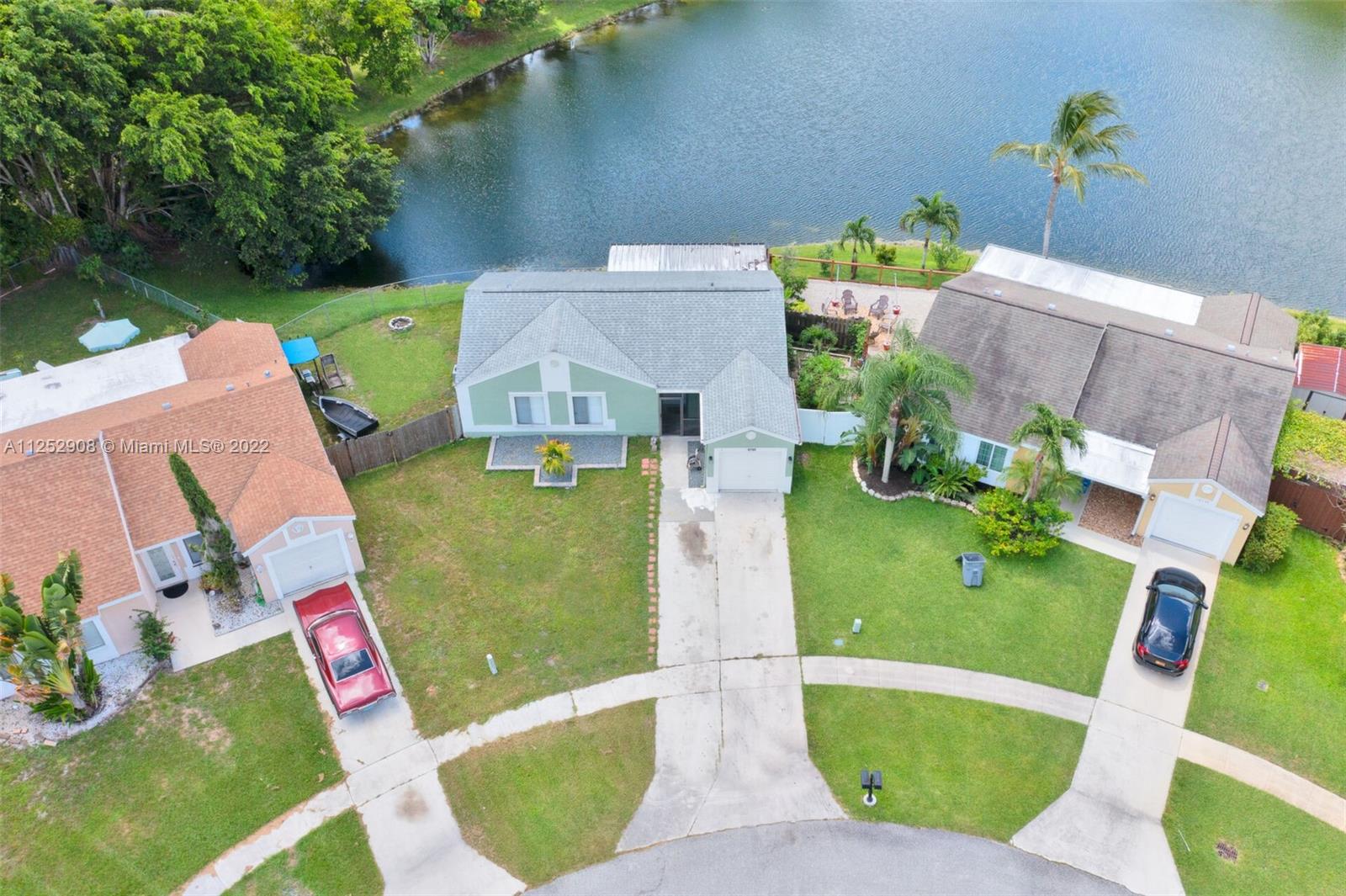 18790 Cloud Lake Circle Boca Raton, FL 33496 - Photo 4 of 27 an aerial view of a house with a garden