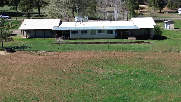 a view of a lake with a house