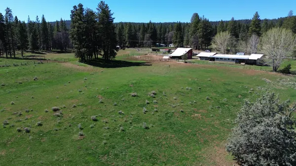 a room with furniture and wooden floor