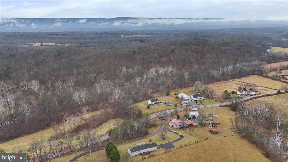 35 Waterstone Lane Berkeley Springs, WV 25411 - Photo 33 of 38 a view of water heater and covered with wooden floor