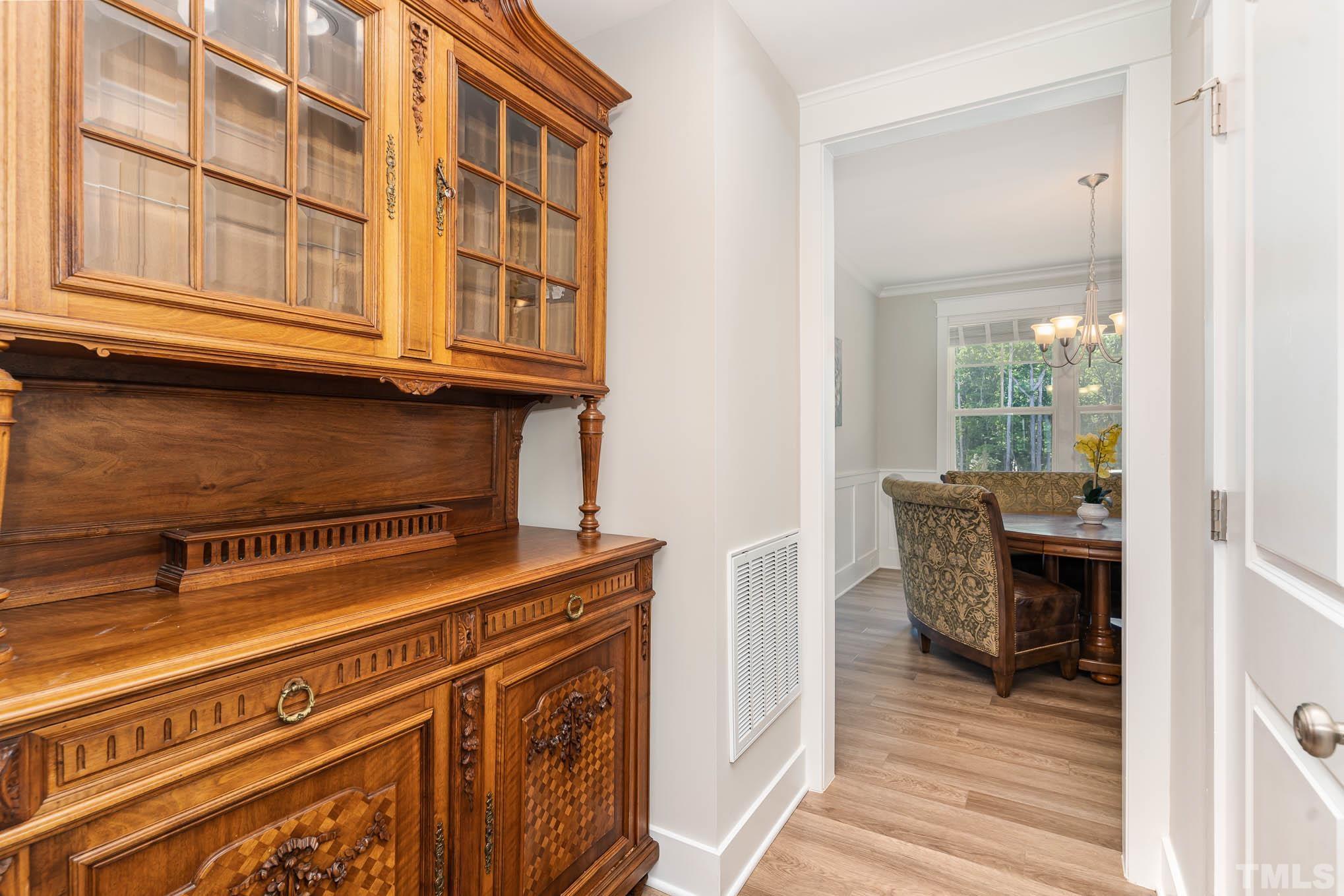 2816 Flume Gate Drive Raleigh, NC 27603 - Photo 21 of 45 a view of a kitchen from the hallway