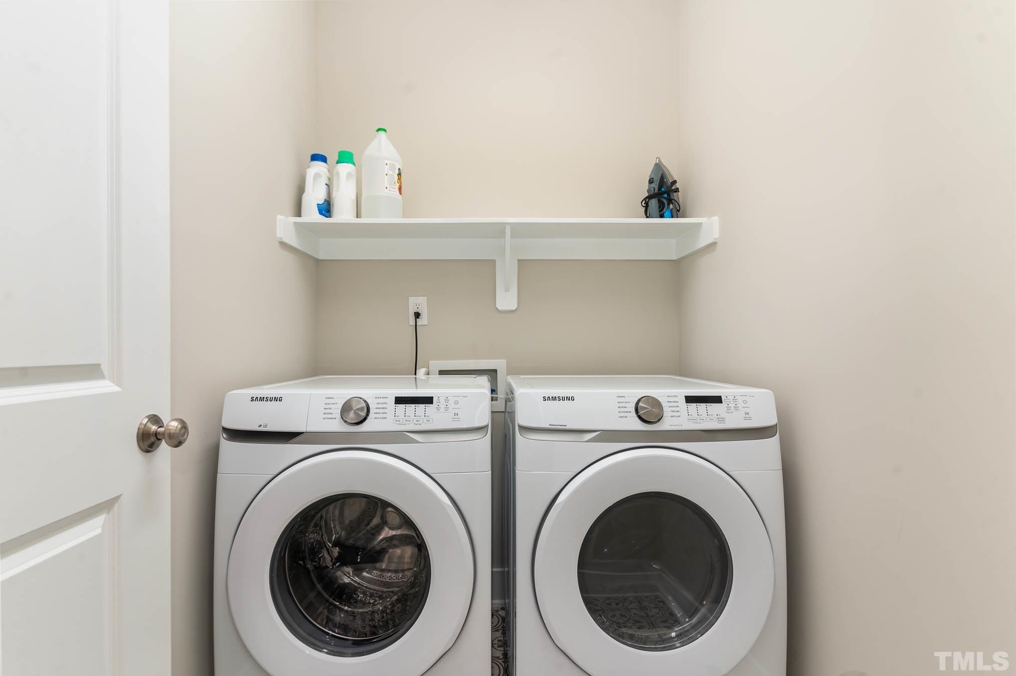 2816 Flume Gate Drive Raleigh, NC 27603 - Photo 25 of 45 a utility room with dryer and washer