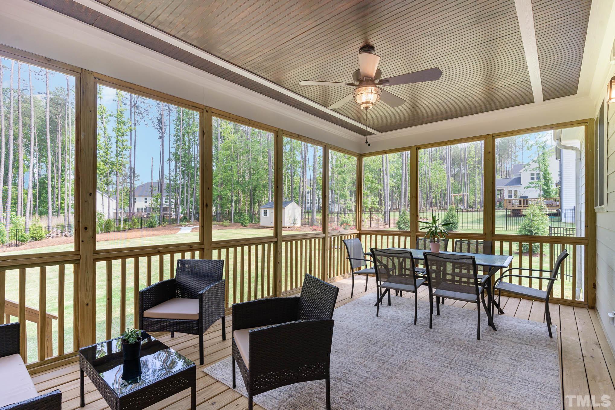 2816 Flume Gate Drive Raleigh, NC 27603 - Photo 32 of 45 a view of a dining room with furniture window and wooden floor