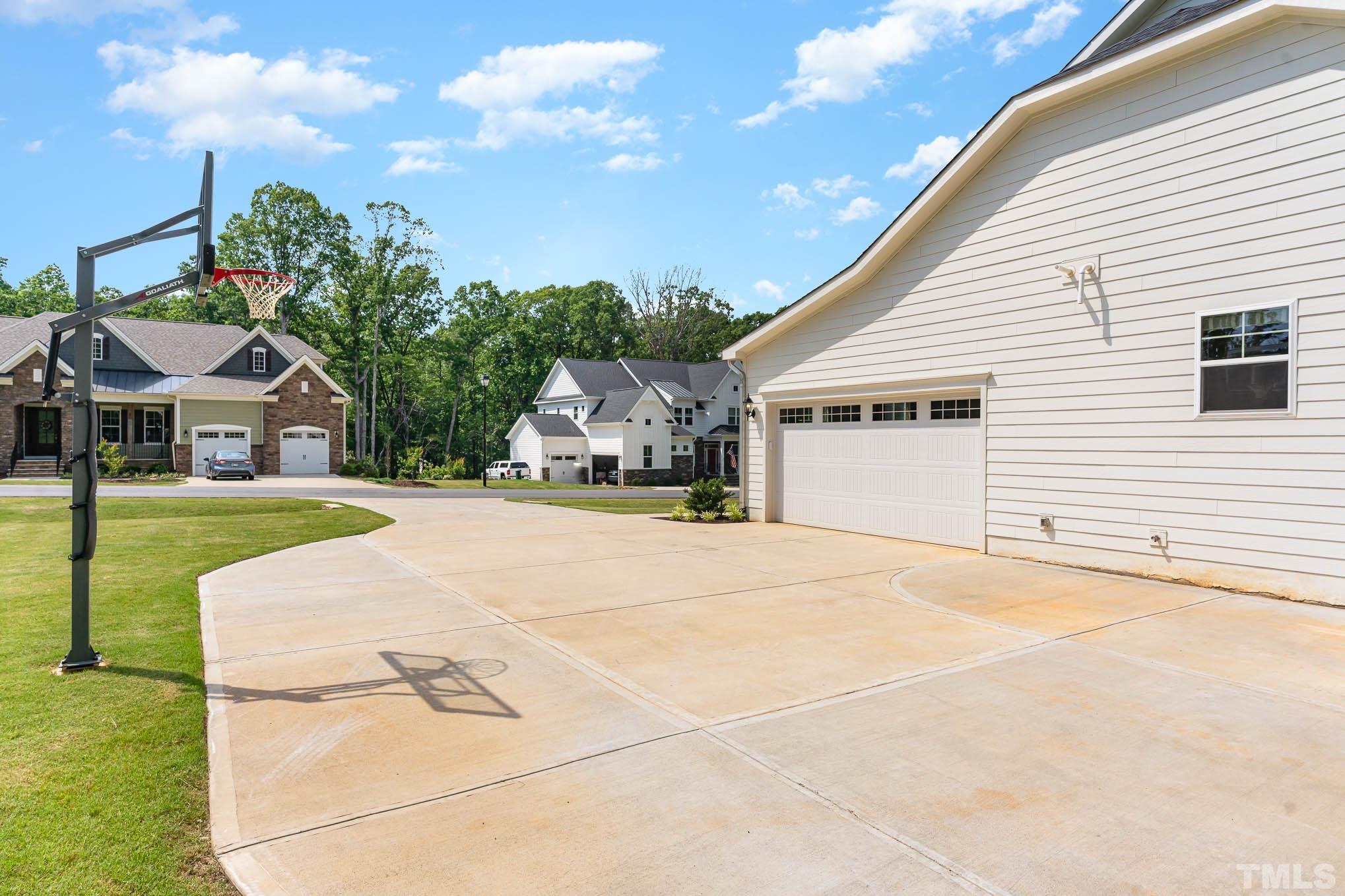 2816 Flume Gate Drive Raleigh, NC 27603 - Photo 35 of 45 a view of outdoor space yard and garage
