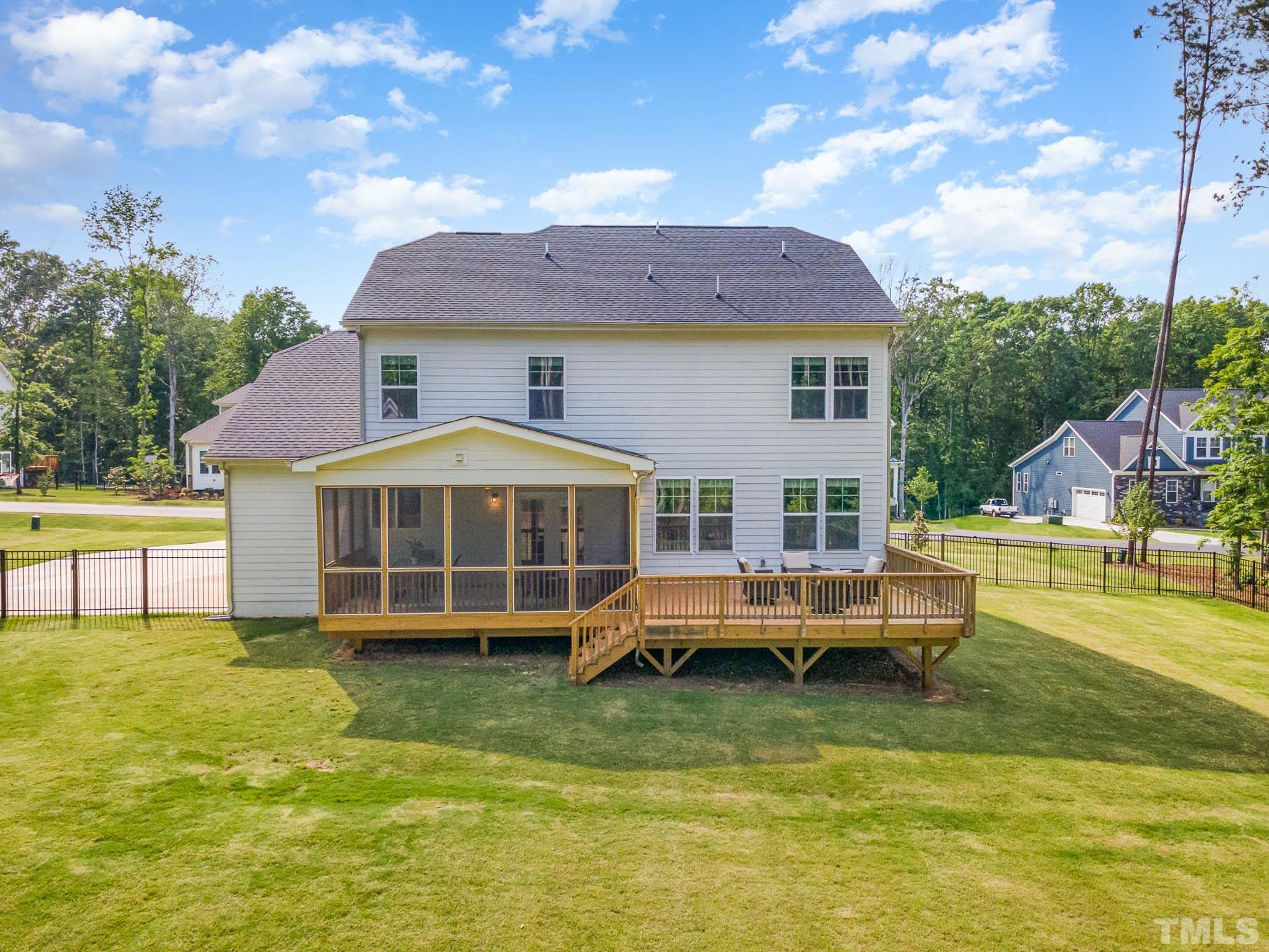 2816 Flume Gate Drive Raleigh, NC 27603 - Photo 42 of 45 a view of a house with a swimming pool