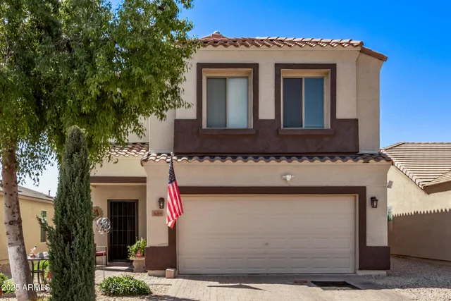 a view of a hallway with staircase