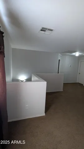 a picture of a table and a potted plant