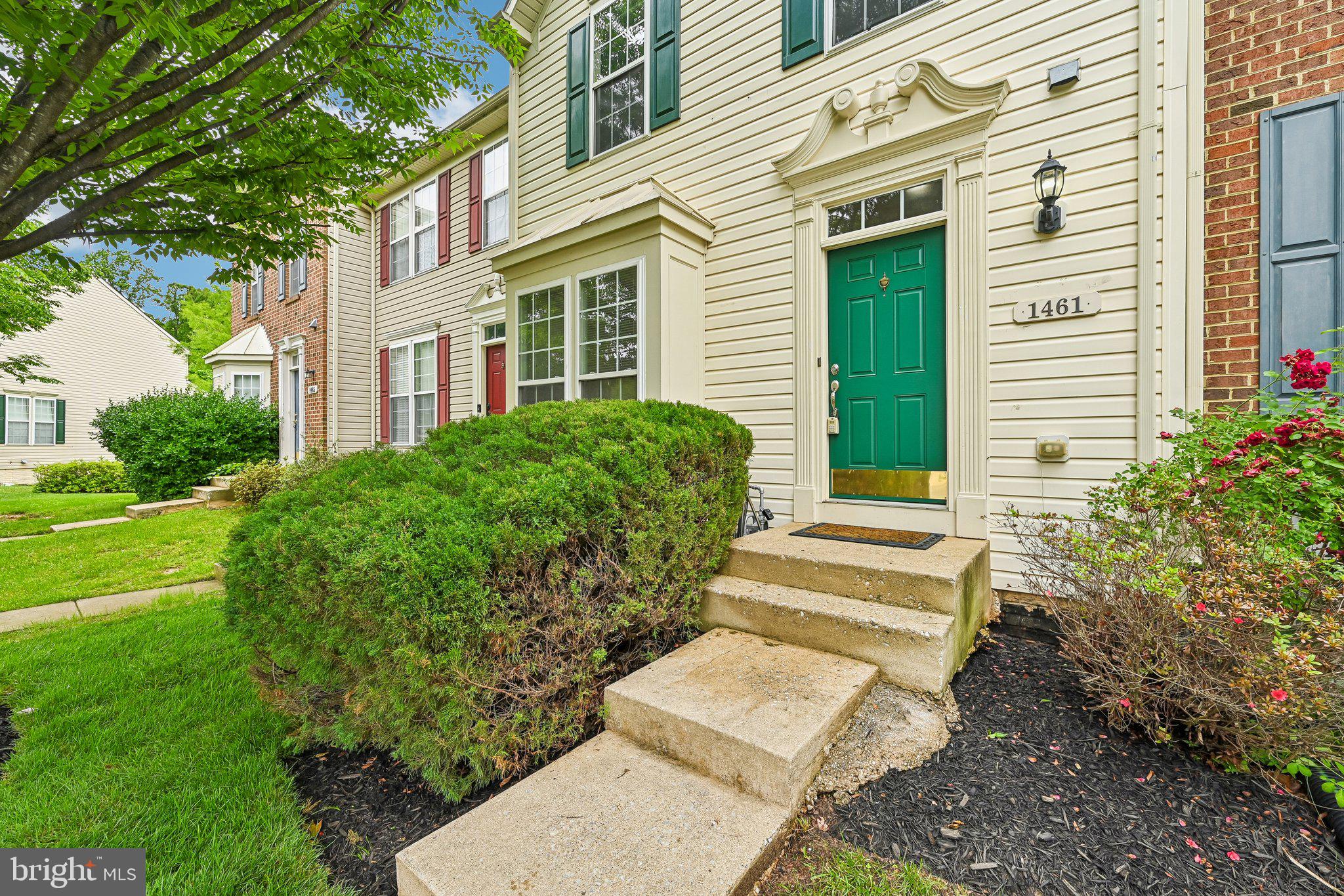 1461 Pangbourne Way Hanover, MD 21076 - Photo 4 of 51 a front view of a house with garden
