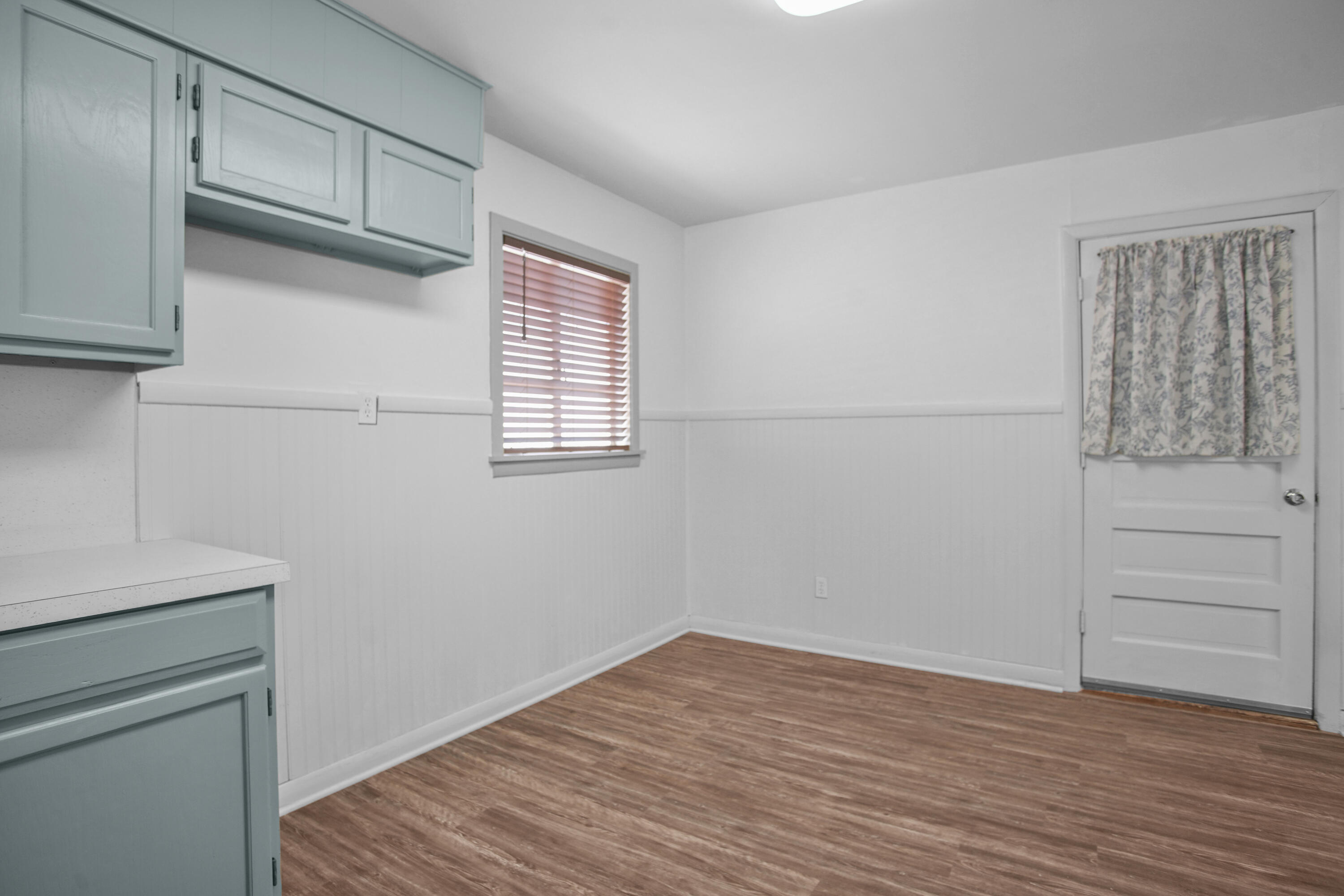 4309 31st Street Lubbock, TX 79410 - Photo 29 of 30 a view of walk in closet with hardwood floor