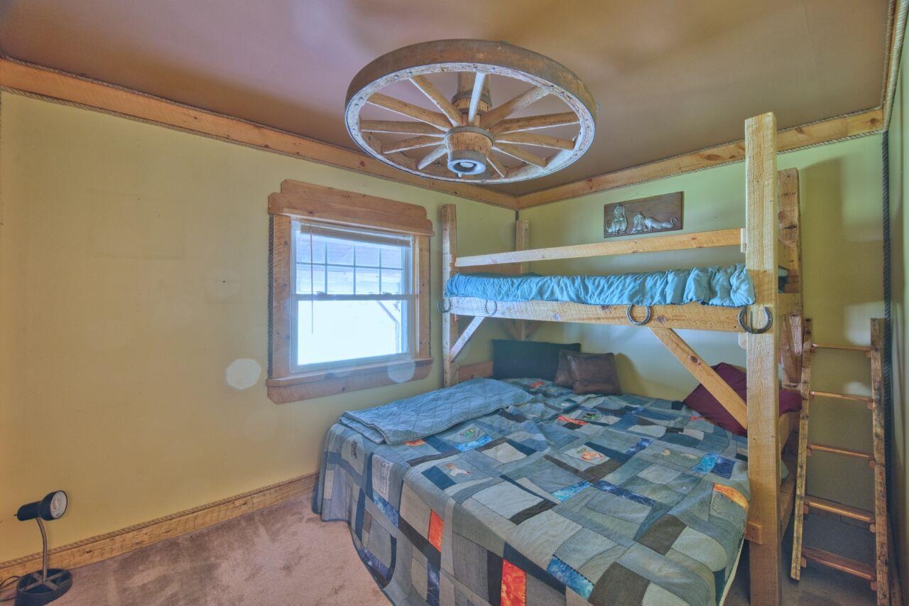 7349 Lax Road Embarrass, MN 55732 - Photo 13 of 36 Bedroom with carpet and baseboards