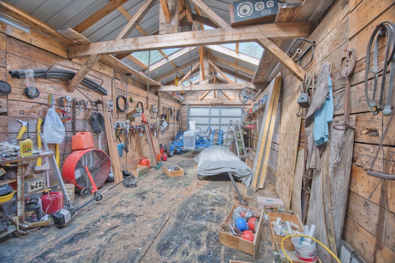 7349 Lax Road Embarrass, MN 55732 - Photo 17 of 36 Miscellaneous room featuring lofted ceiling and a garage