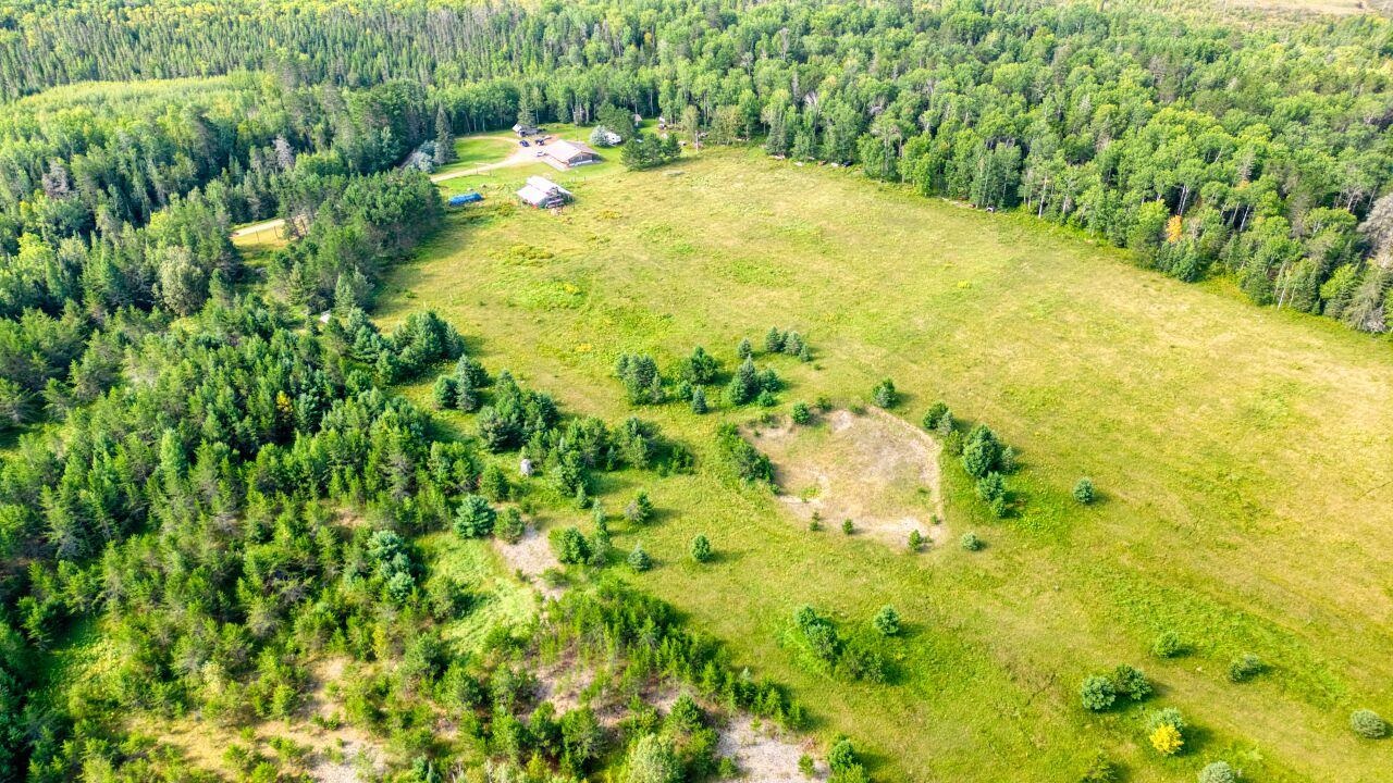 7349 Lax Road Embarrass, MN 55732 - Photo 33 of 36 Drone / aerial view of a heavily wooded area