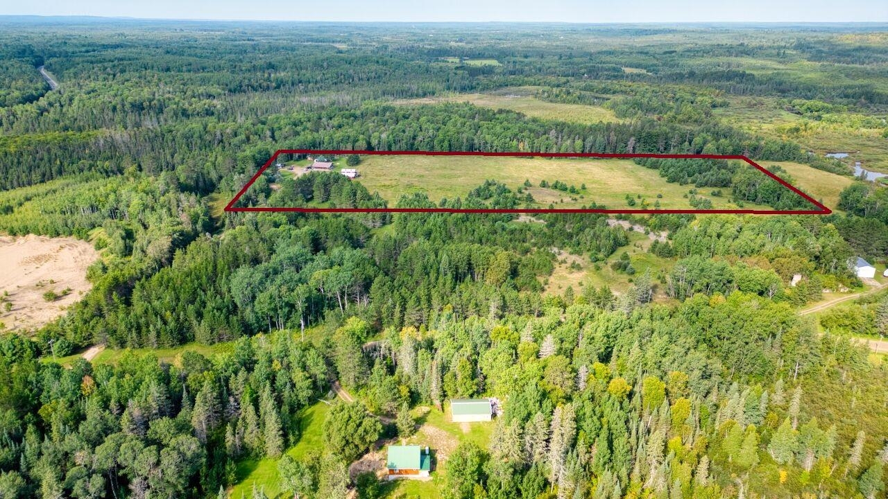 7349 Lax Road Embarrass, MN 55732 - Photo 35 of 36 Aerial view of property and surrounding area with a heavily wooded area and property boundaries highlighted