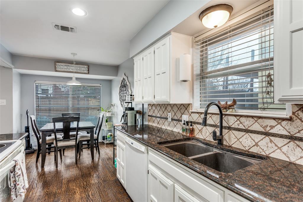 6304 Old Mill Circle Watauga, TX 76148 - Photo 13 of 25 a kitchen with sink cabinets and dining table