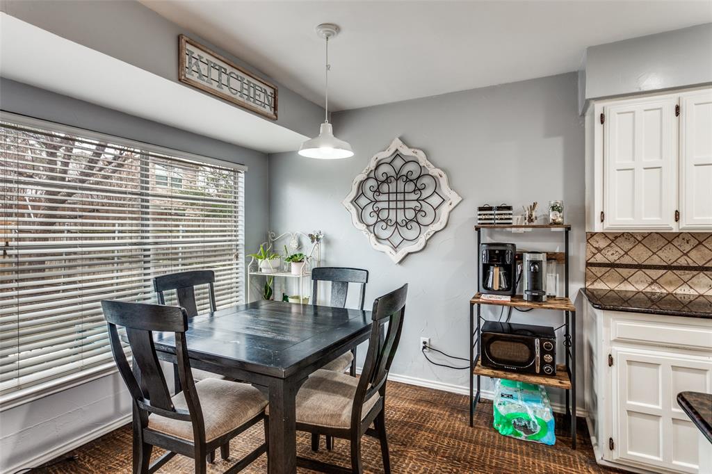 6304 Old Mill Circle Watauga, TX 76148 - Photo 14 of 25 a view of a dining room with furniture window and wooden floor