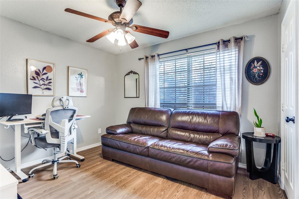 6304 Old Mill Circle Watauga, TX 76148 - Photo 16 of 25 a living room with furniture and a window