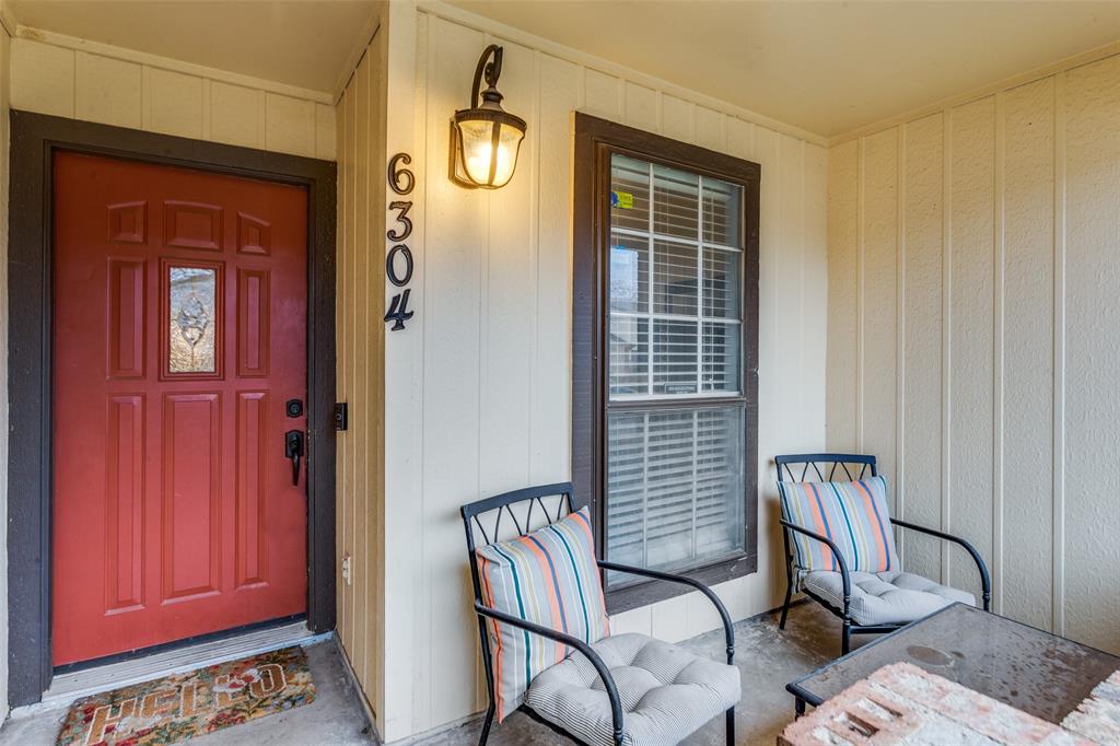 6304 Old Mill Circle Watauga, TX 76148 - Photo 4 of 25 a view of a livingroom with furniture and a window