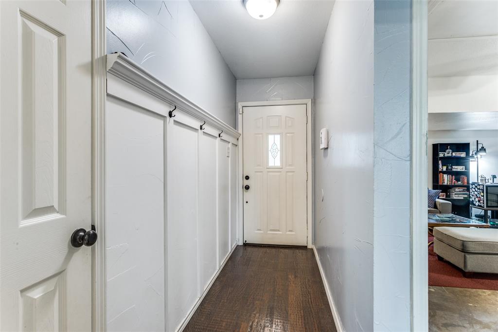 6304 Old Mill Circle Watauga, TX 76148 - Photo 5 of 25 a view of a livingroom from a hallway
