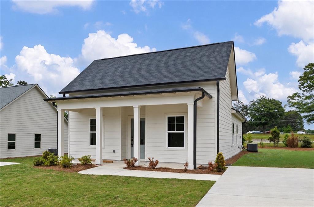 103 Winston Way Carrollton, GA 30117 - Photo 1 of 24 a front view of house with yard