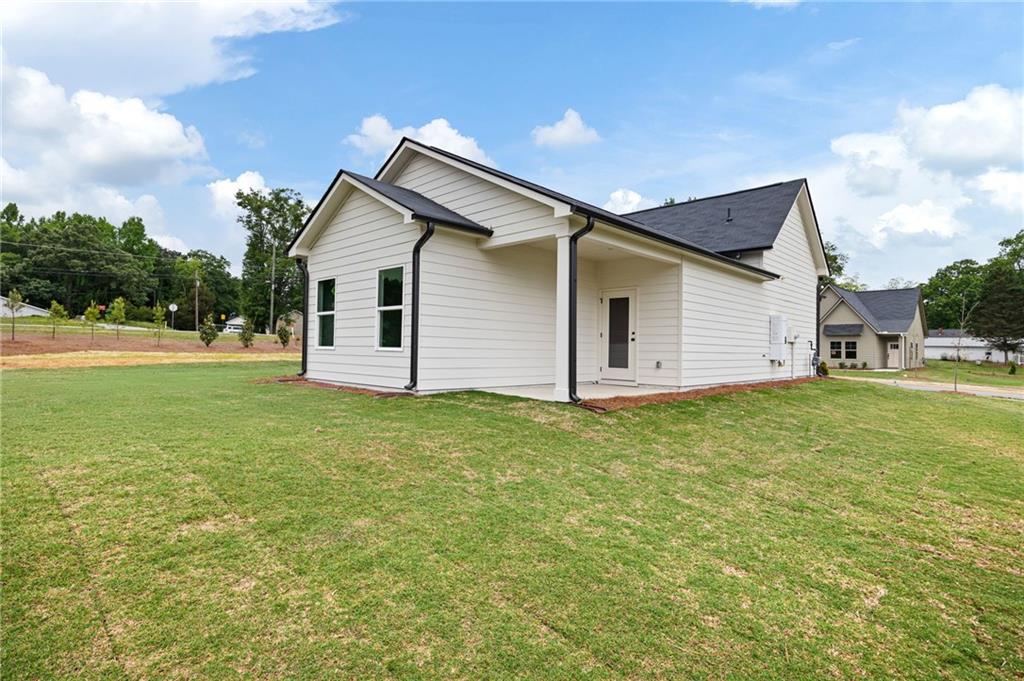 103 Winston Way Carrollton, GA 30117 - Photo 20 of 24 a backyard of a house with lots of green space