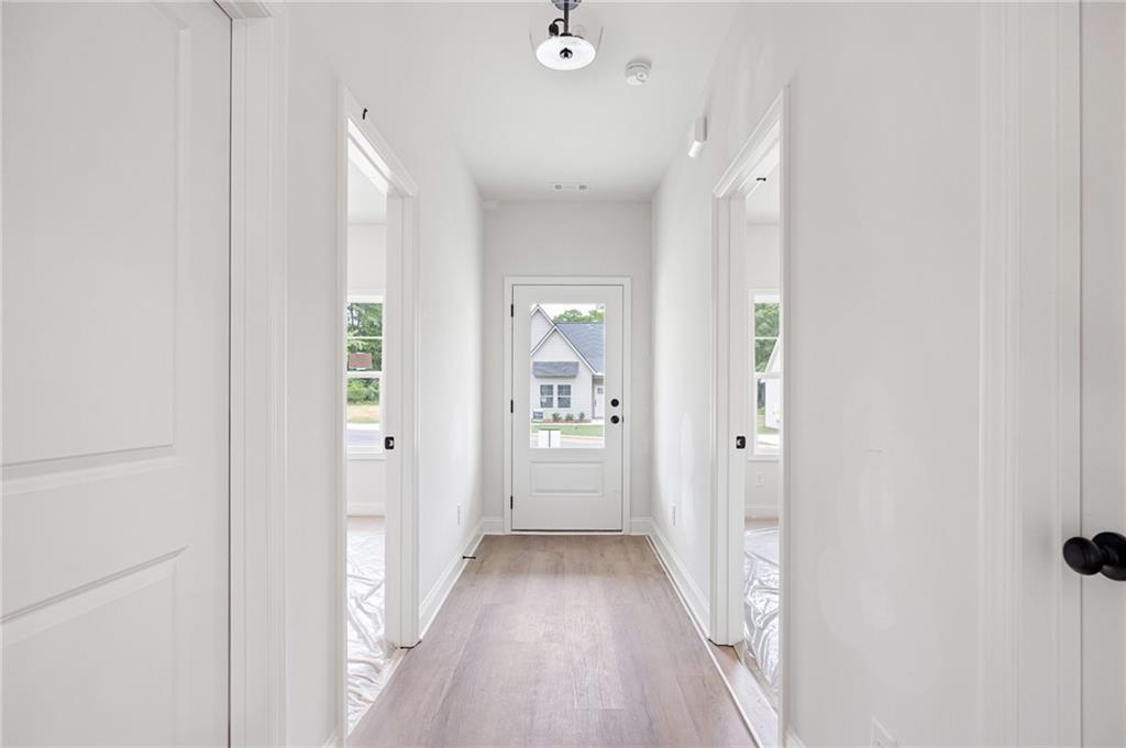 103 Winston Way Carrollton, GA 30117 - Photo 4 of 24 a view of a hallway with a white walls