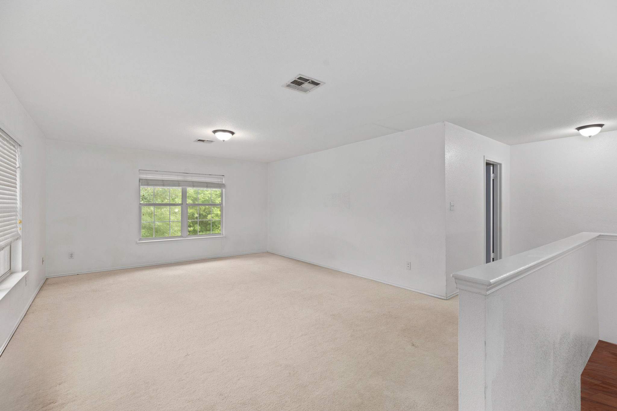 144 Vicksburg Loop Elgin, TX 78621 - Photo 22 of 23 a view of an empty room with a window