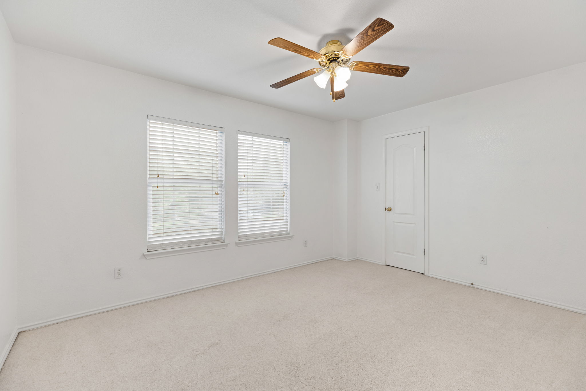 144 Vicksburg Loop Elgin, TX 78621 - Photo 23 of 23 an empty room with a window