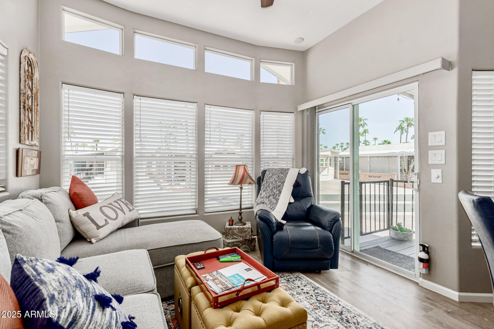 1374 West Chesapeake Avenue Apache Junction, AZ 85119 - Photo 11 of 33 a living room with furniture and a large window